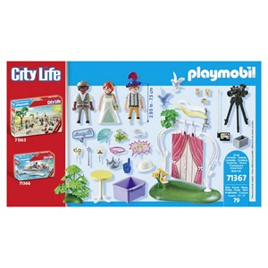 Couple de mariés et appareil photo