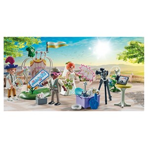 Couple de mariés et appareil photo