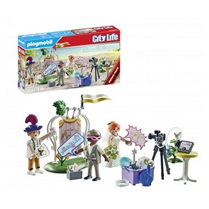 Couple de mariés et appareil photo