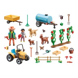 Fermier avec tracteur et citerne