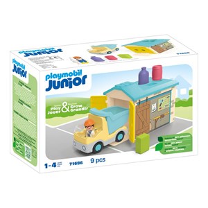 Ouvrier avec camion et garage