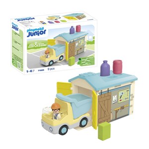 Ouvrier avec camion et garage