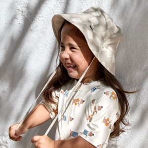 Chapeau réversible anti-uv motif damier stone et sel marin (3-6 mois)