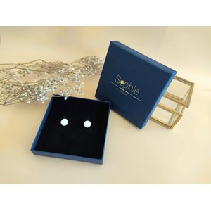 Clous d'oreille dentelés dorés et nacre