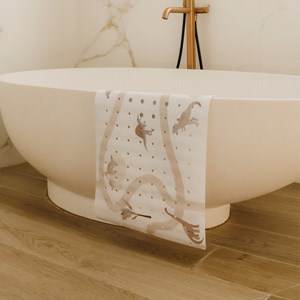 Tapis de bain - le dino