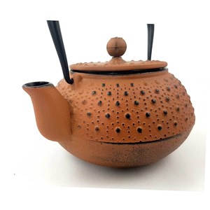 Théière en fonte orange  orange