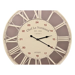 Horloge ancienne chef le normand métal
