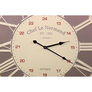 Horloge ancienne chef le normand métal