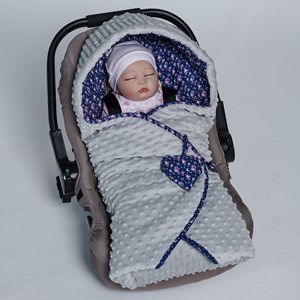 Couverture enveloppante réversible