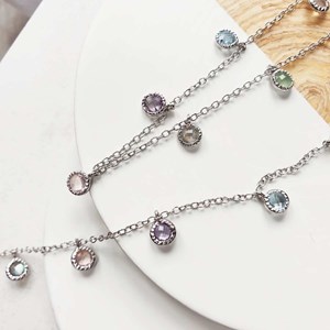 Boucle d'oreille améthyste et calcé