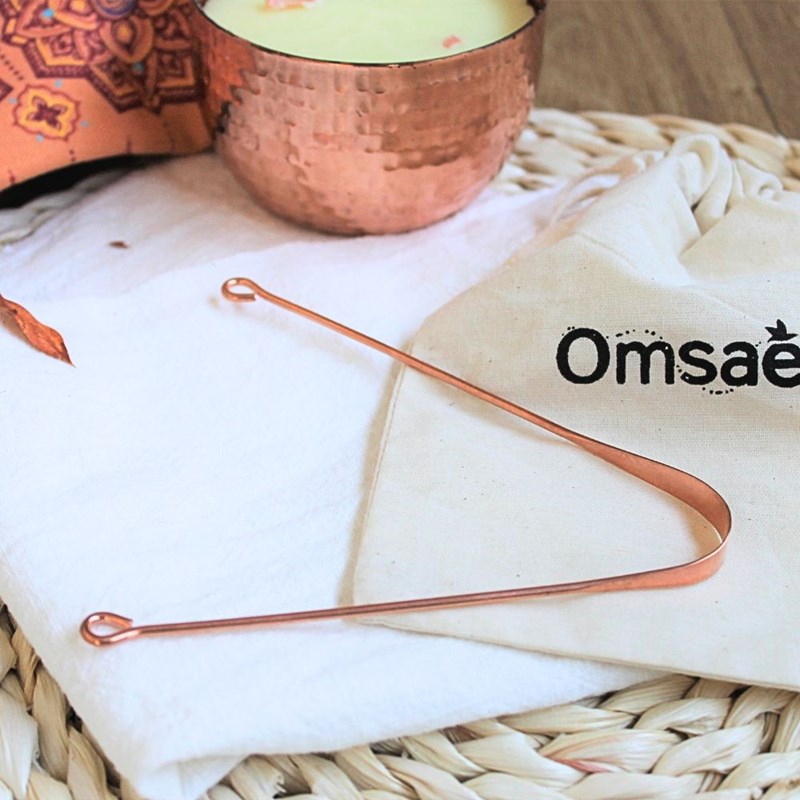 Gratte-langue en cuivre