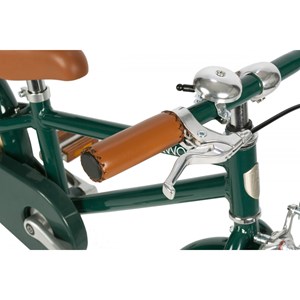 Vélo vintage avec stabilisateurs vert