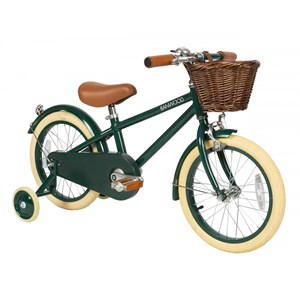 Vélo vintage avec stabilisateurs vert