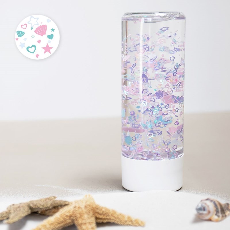 Bouteille sensorielle coquillages – jouet d’éveil et outil de retour au calme