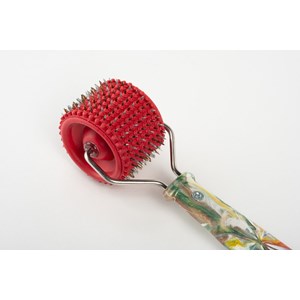 Roller de massage visage rouge