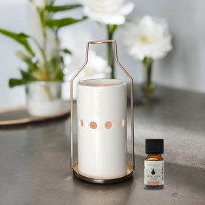 Brûle-parfum et huile essentielle dos