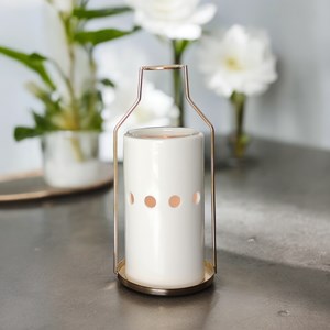 Brûle-parfum et huile essentielle dos