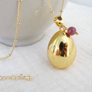 Bola goutte or, juillet rubis