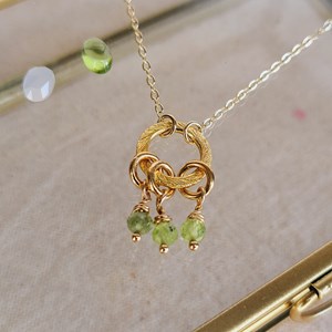Collier or péridot