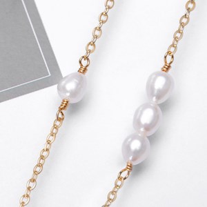 Collier double chaine et perles d'eau