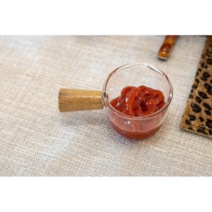 Mini casserolette en verre avec manche en bois