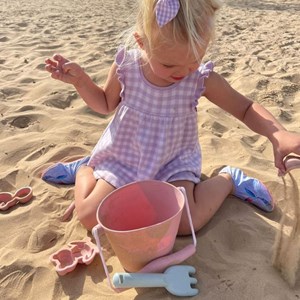 Râteau de plage rose