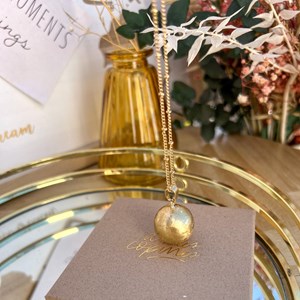 Bola de grossesse or brossé