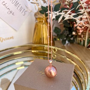 Bola de grossesse or rose