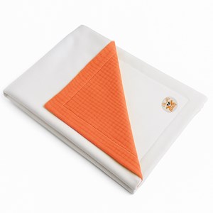 Couverture en coton bio blanc et fraise