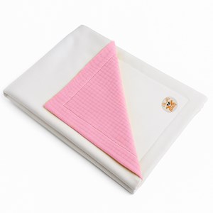 Couverture en coton bio blanc et rose