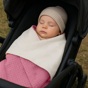 Couverture en coton bio blanc et rose