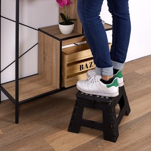 Marche pied pliable compact noir