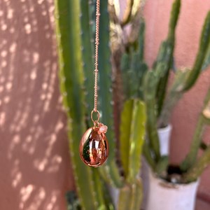 Bola de grossesse goutte or rose