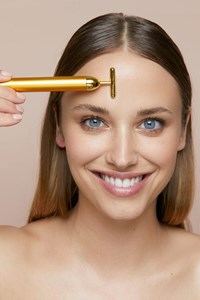 Masseur électrique visage golden pulse