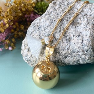 Bola de grossesse or avec petit pieds