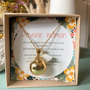 Bola de grossesse or avec petit pieds