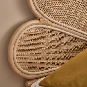 Tête de lit bohème en rotin et cannage