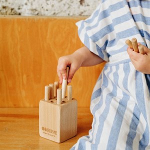 Tourillon, développe la motricité fine