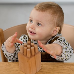 Tourillon, développe la motricité fine