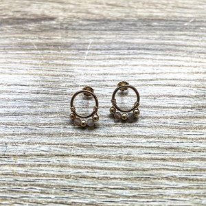 Puces d'oreilles pierre de soleil maya