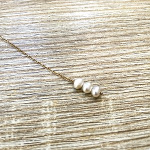 Collier perles mariage dos nu odette