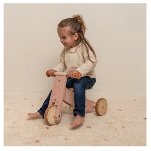 Tricycle en bois rose