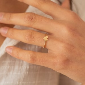 Bague réglable coeur porte bonheur doré