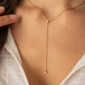 Collier décolleté doré - cristal blanc