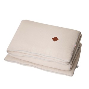 Couette et oreiller prêt à dormir beige