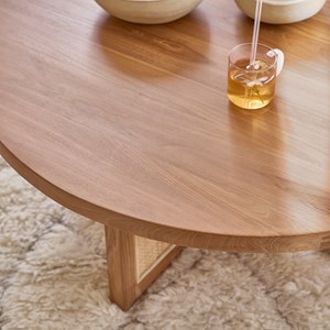 Table basse ronde en teck pied cannage