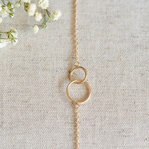 Bracelet or 2 anneaux entrelacés cercles