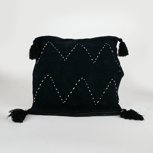 Housse de coussin noire à motifs blanc