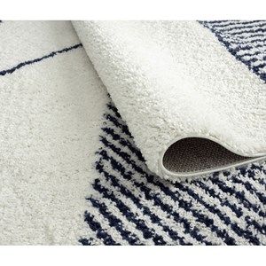Tapis enfant crème bleu motifs géométriq
