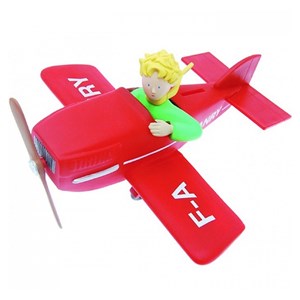 Tirelire le petit prince dans son avion
